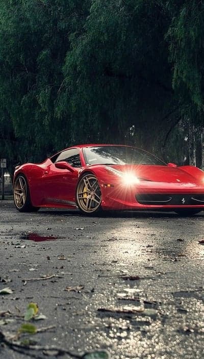 Red Ferrari 458 Italia On Wet Road Phone Wallpaper