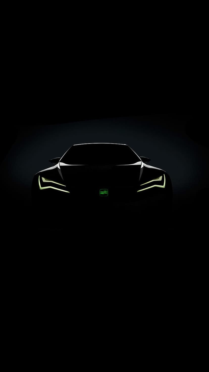 Sleek car silhouette featuring bright LED headlights and a neon green emblem emerging from deep shadows.
