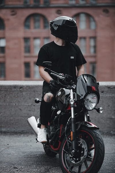 Dark Aesthetic Motorcyclist Portrait Phone Wallpaper