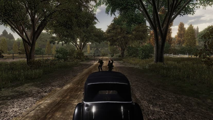 Vintage black car on a dirt road facing two WWII soldiers in a dense forest with a moody sky.
