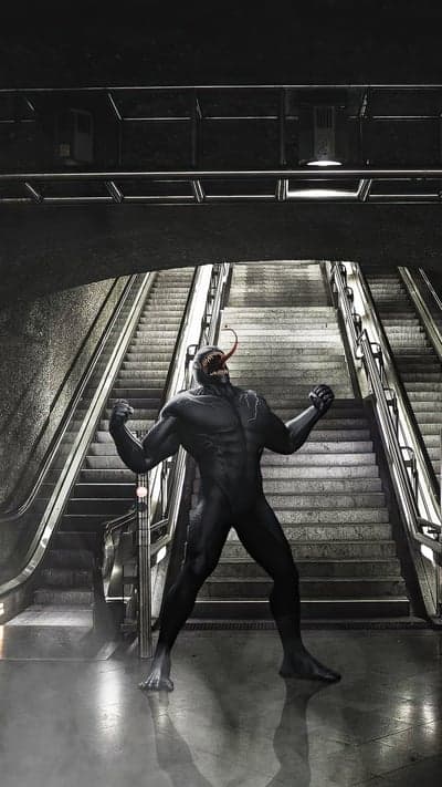 Venom strikes on subway stairs with menacing tongue