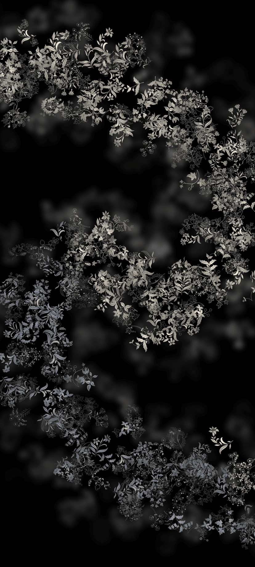 White floral vines and small leaves cascade over a dark background with soft bokeh highlights and vertical depth.