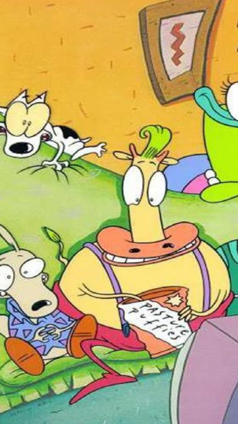 Rocko the wallaby and Heffer lounge on a green couch while Filbert and Ickis peek out from a cozy yellow room.