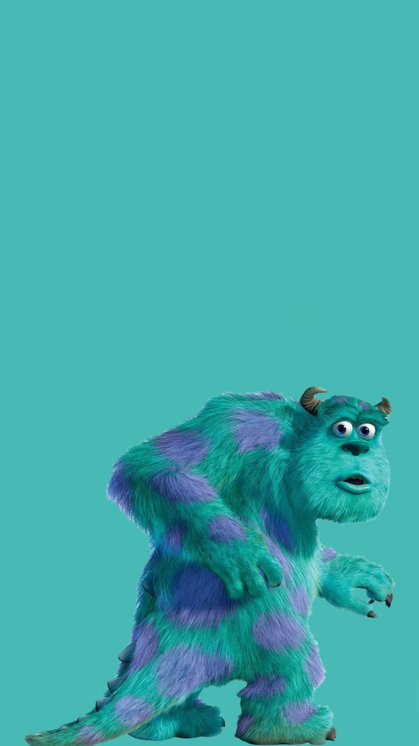 Sulley the blue furry monster with purple spots walks forward against a solid teal background in a vertical view.