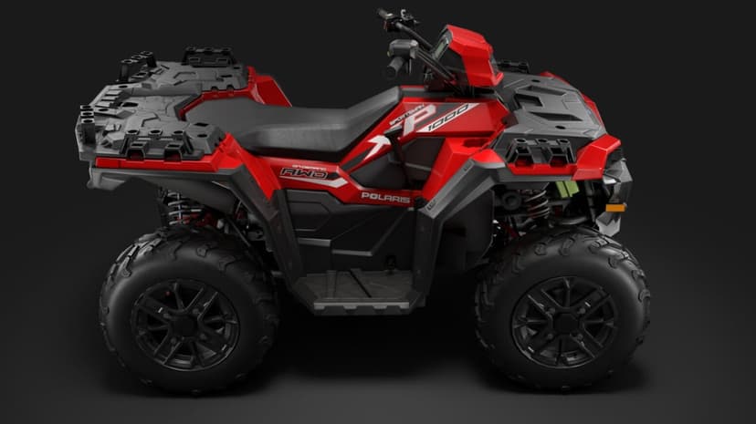 Red Polaris Sportsman XP 1000 ATV side profile with aggressive off-road tires against a dark gray background.