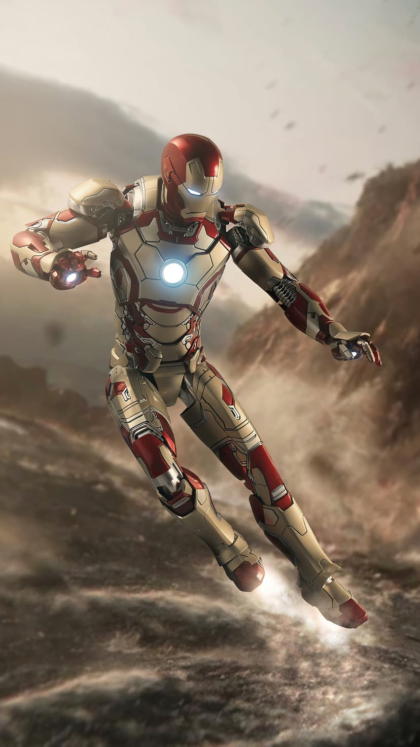Iron Man in red and gold armor flies over rocky cliffs with glowing thrusters against a misty, sunlit sky.