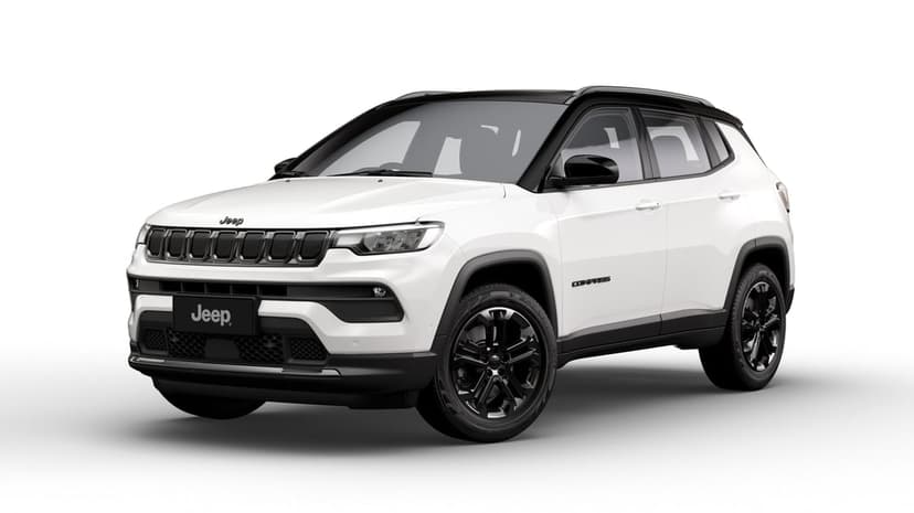 White Jeep Compass SUV with a black roof and black wheels parked in a bright white studio environment.