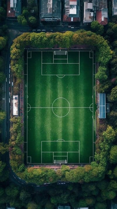 Aerial Drone View of a Lush Green Football Field