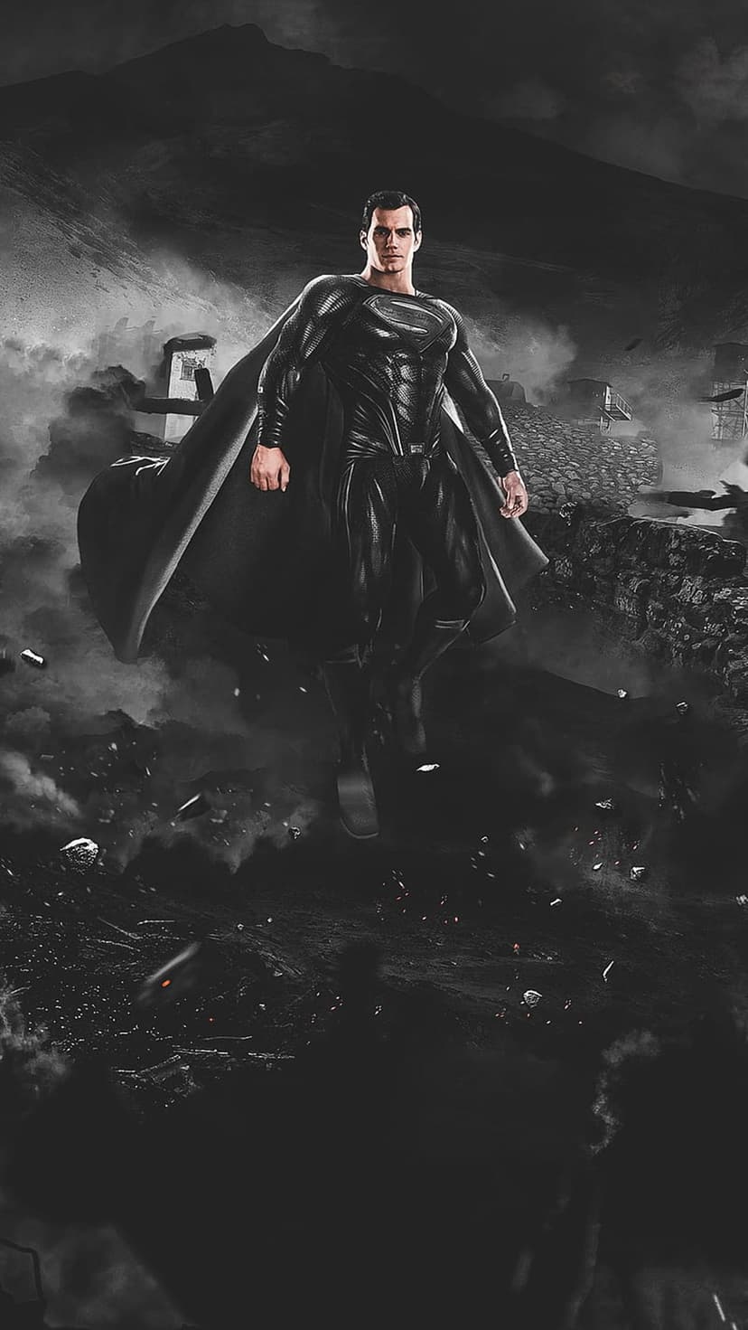 Superman in a black suit flies above smoking ruins and jagged mountains under a dark, overcast sky.