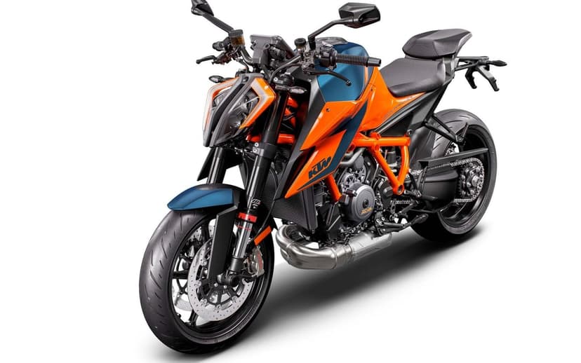 KTM Super Duke R Evo motorcycle in orange and blue colors parked against a clean white studio background.
