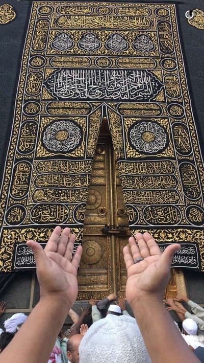 Pilgrims Praying at the Kaaba Door in Mecca