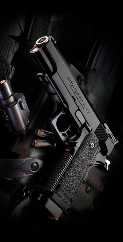 Black Handgun with Bullets and Tactical Light