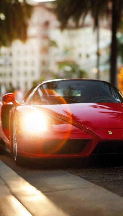 Red Ferrari Enzo Glowing Headlight Mobile Wallpaper