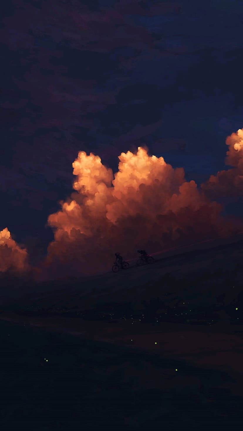 Two cyclists silhouetted on a dark ridge stand against glowing orange clouds and a moody, deep twilight sky.