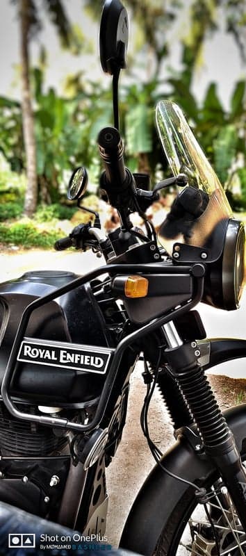 Dark Royal Enfield Motorcycle Mobile Background Close-up