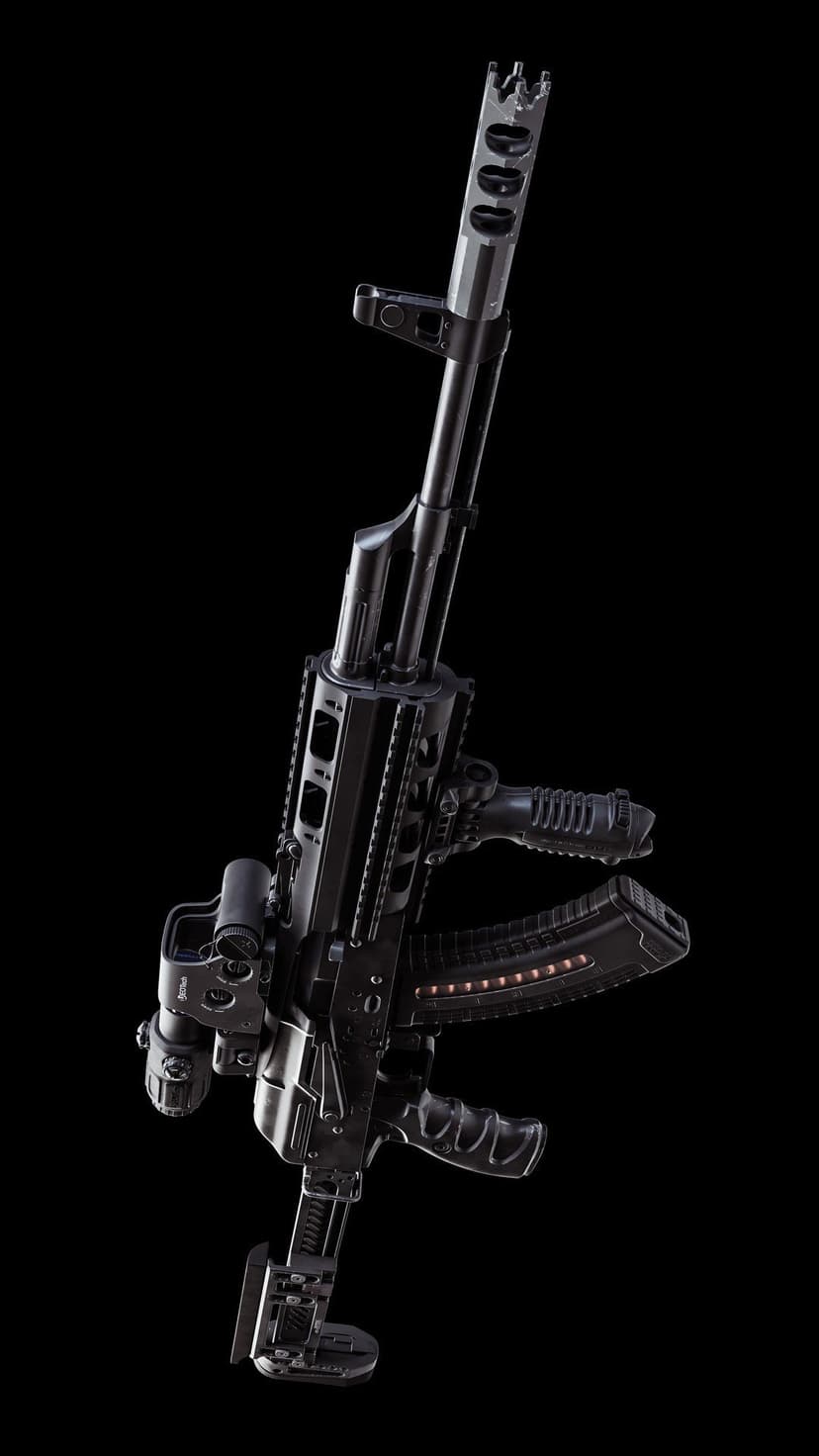 Tactical AK-47 rifle with red dot sight, vertical grip, and extended magazine against a solid black background.