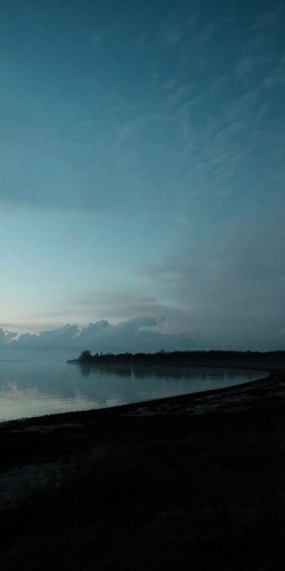 Whispers on the Water - A Moody Dawn