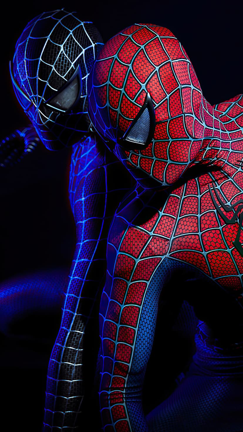 Spider-Man in red and blue webbing faces a sleek black symbiote suit under dramatic blue atmospheric lighting.