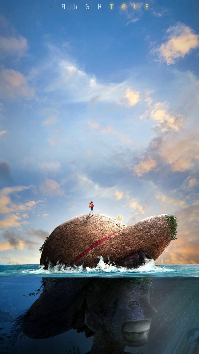 Rocky island peak with a small human silhouette above a massive serene face submerged in deep blue ocean water.