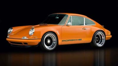 Classic Orange Porsche 911 Sports Car Desktop Wallpaper