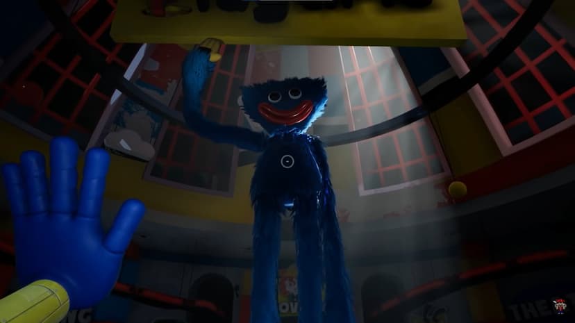 Blue Huggy Wuggy monster looms from a low angle with dramatic light beams in a Poppy Playtime game room.