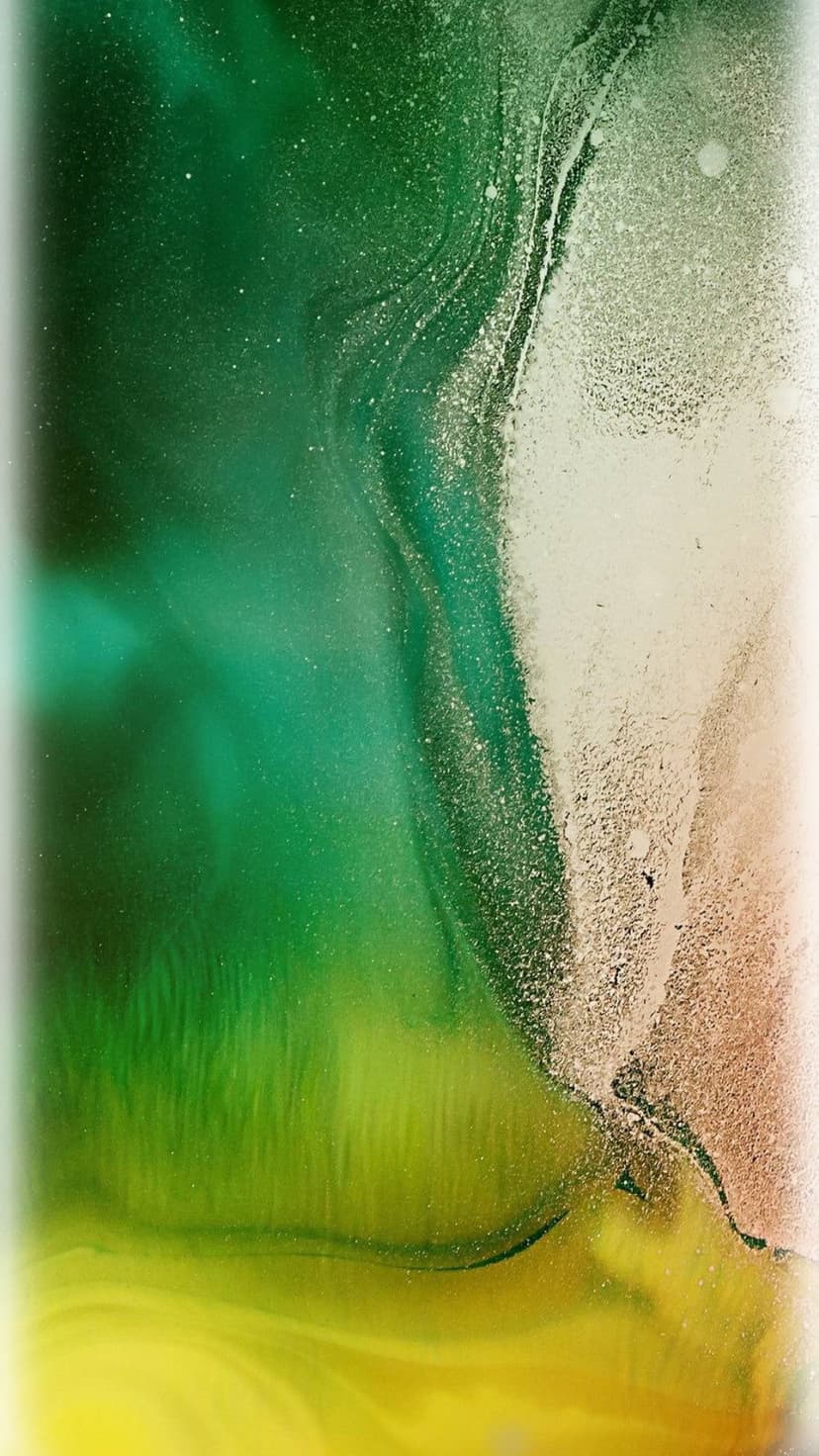 Swirling lime green and yellow liquid patterns with a fine glitter texture and organic marble-like flow.
