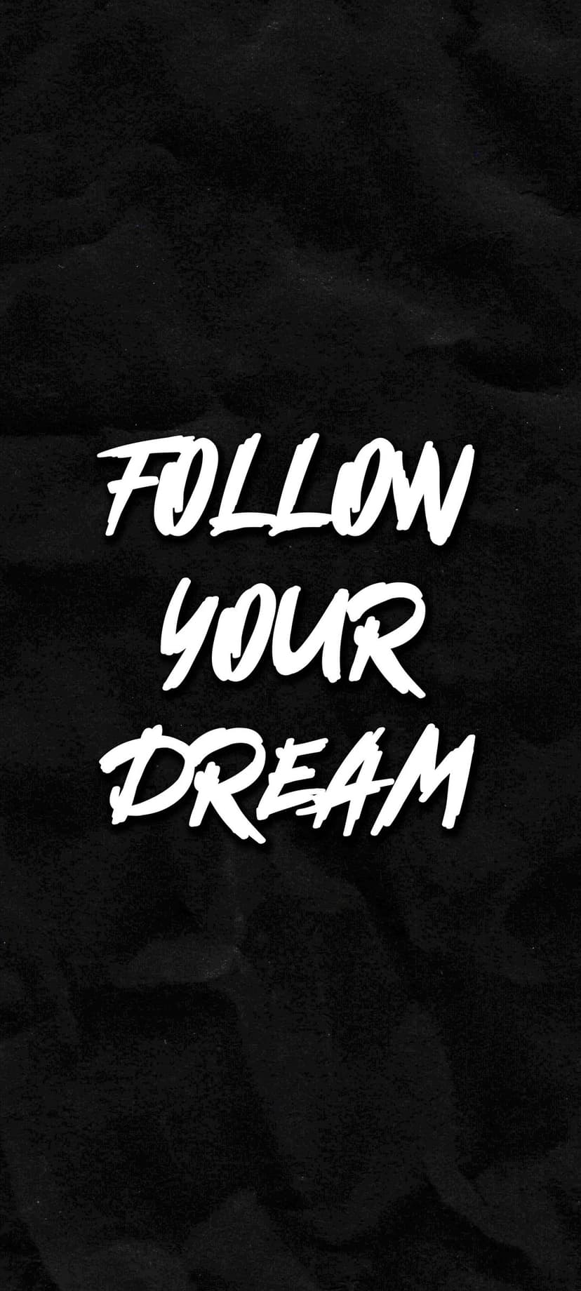 Follow Your Dream text in white brushstroke lettering centered on a dark, grainy textured background surface.
