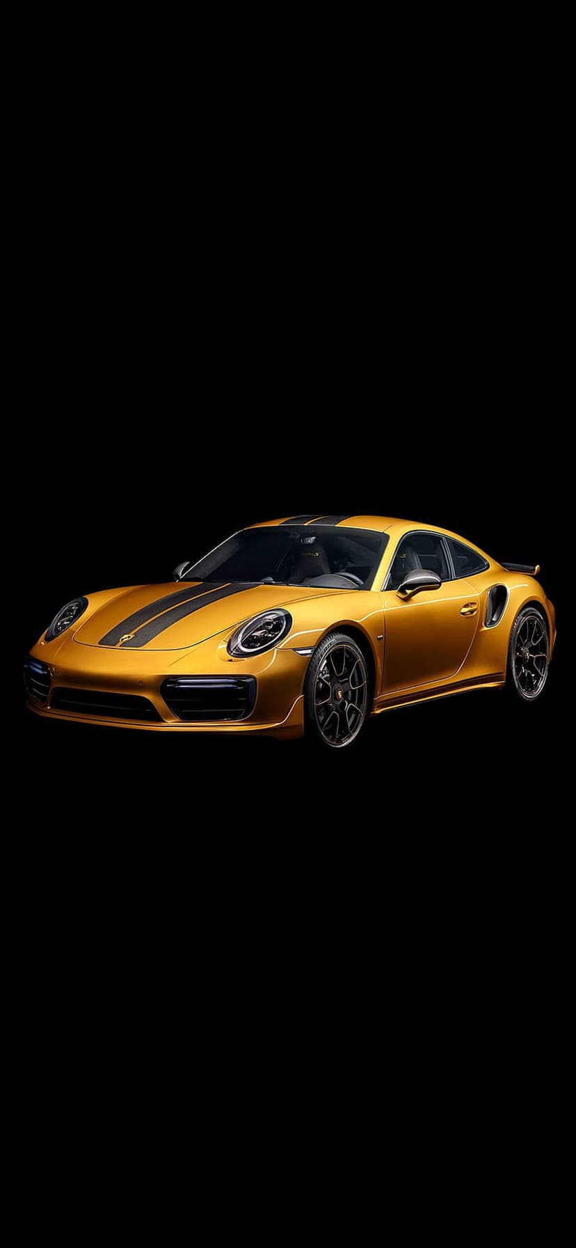Gold Porsche 911 Turbo S with black racing stripes centered on a solid dark background in portrait mode.