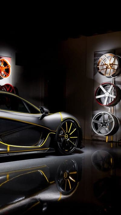 Sleek Stealth McLaren P1 Hypercar Yellow Accent Wallpaper