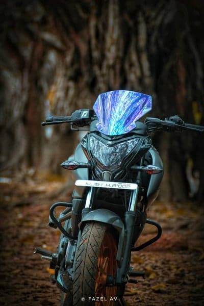 Customized Motorcycle with Blue Windshield in Nature