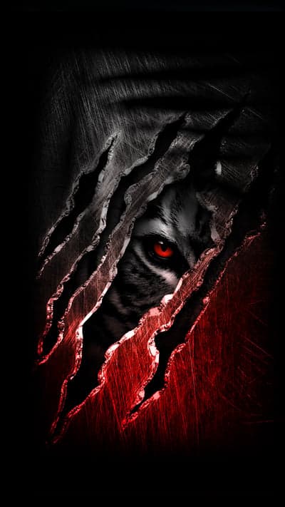 Glowing Red Tiger Eye Through Torn Metal Mobile Backdrop