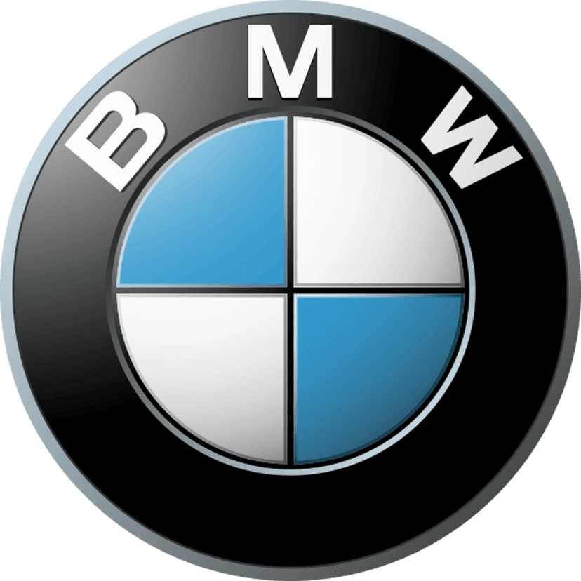 BMW logo featuring blue and white quadrants inside a black circular frame with silver metallic lettering.