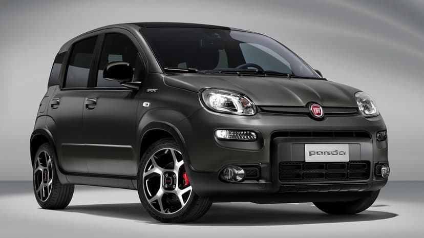 Matte grey Fiat Panda Sport with red brake calipers and black roof in a minimalist white studio environment.