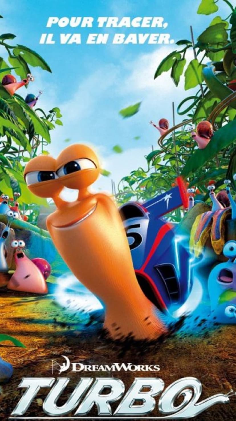 Turbo the snail with an orange shell and blue eyes leads a group of snails near a racing car in a grassy field.