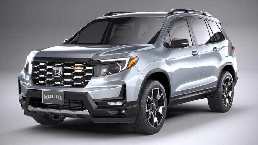 Silver modern SUV with black off-road accents parked in a neutral studio with soft overhead lighting.