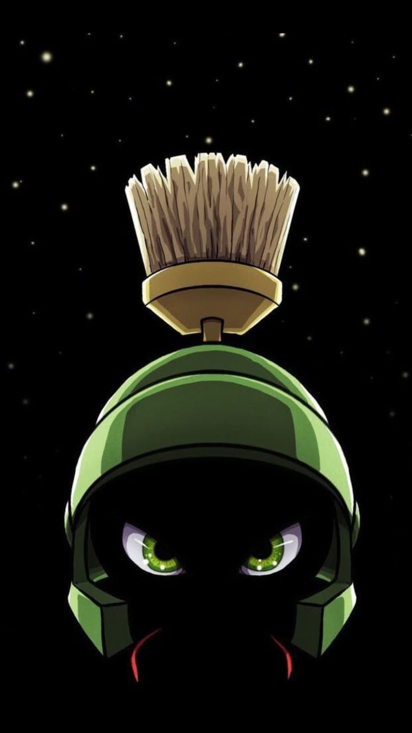 Marvin the Martian wears a green space helmet with glowing eyes against a black starfield in this vertical view.