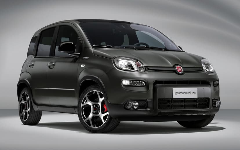 Matte grey Fiat Panda Sport with geometric alloy wheels and red brake calipers in a studio setting.