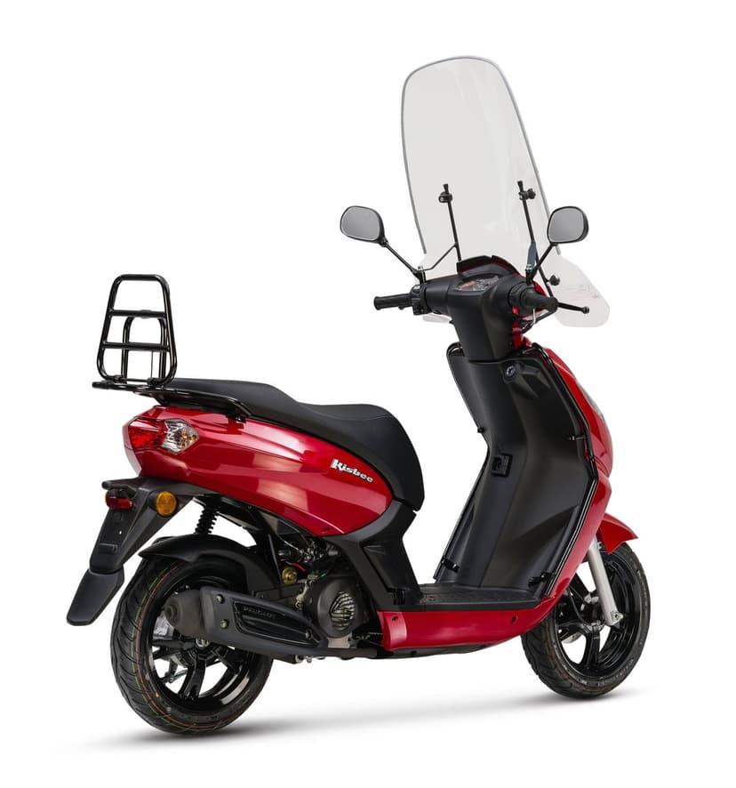 Red Peugeot Kisbee scooter featuring a tall clear windshield and black rear rack against a solid white background.