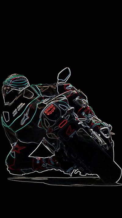 Motorcyclist Leaning into a Sharp Turn on a Racetrack