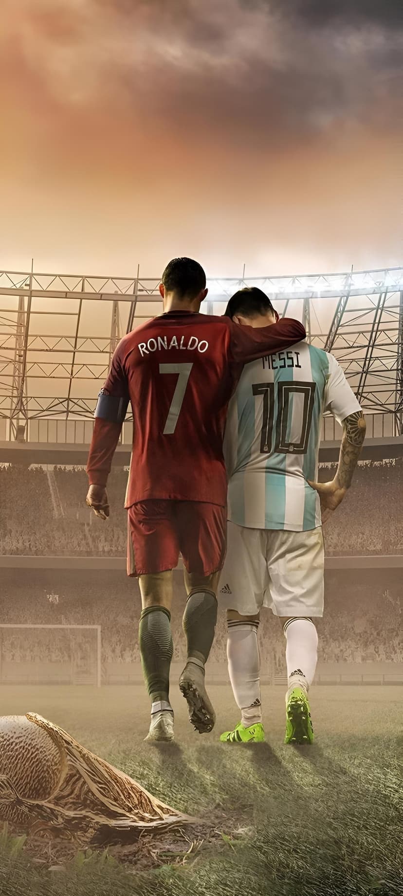 Cristiano Ronaldo and Lionel Messi walk on a grass field under a dramatic sky in a crowded football stadium.