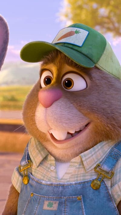 Chester Rabbit wears a carrot hat and overalls