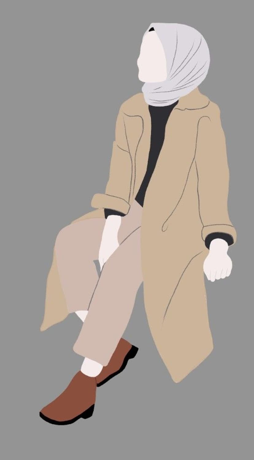 Woman wearing a light grey hijab, long beige coat, and brown boots stands against a solid grey background.