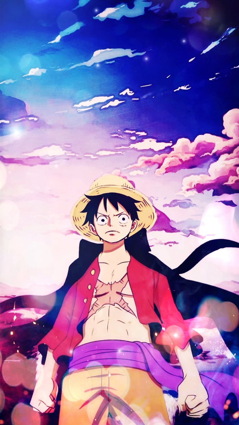 Monkey D. Luffy wearing his straw hat and red vest stands before a dramatic sky with swirling white and blue clouds.