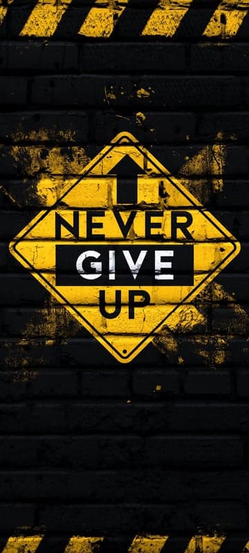 Never Give Up motivational warning sign wallpaper