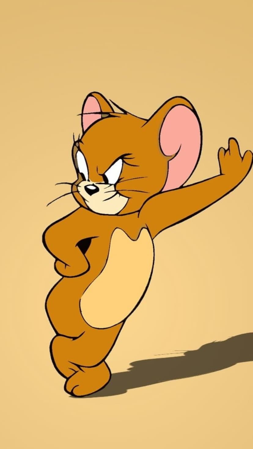 Jerry the Mouse stands defiantly with one finger pointed up and a hand on his hip against a light brown backdrop.