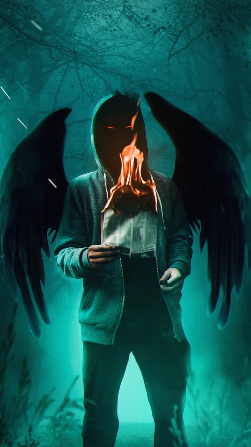 Hooded figure with black wings holding burning parchment in a misty forest illuminated by teal and orange light.
