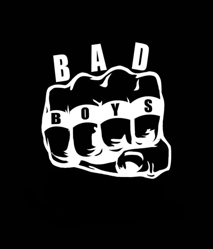 White stylized fist with the word BOYS on knuckles and BAD written above it against a solid black background.