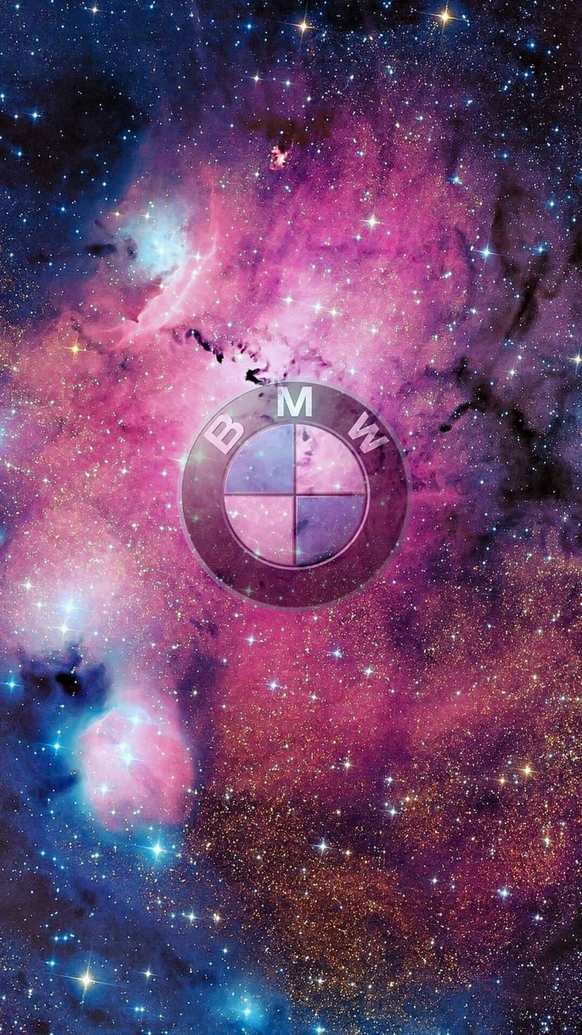 BMW emblem centered over a swirling blue and magenta galaxy nebula with distant glowing stars and gas clouds.