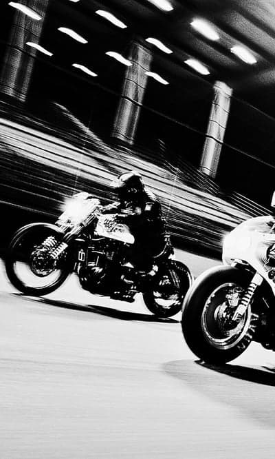 Dynamic Black and White Motorcycle Race Blur