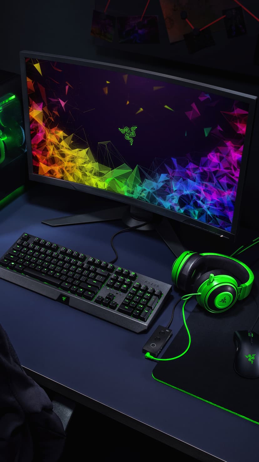 Mechanical keyboard with green backlit keys sits near a mouse and headphones in a dark room with neon lighting.